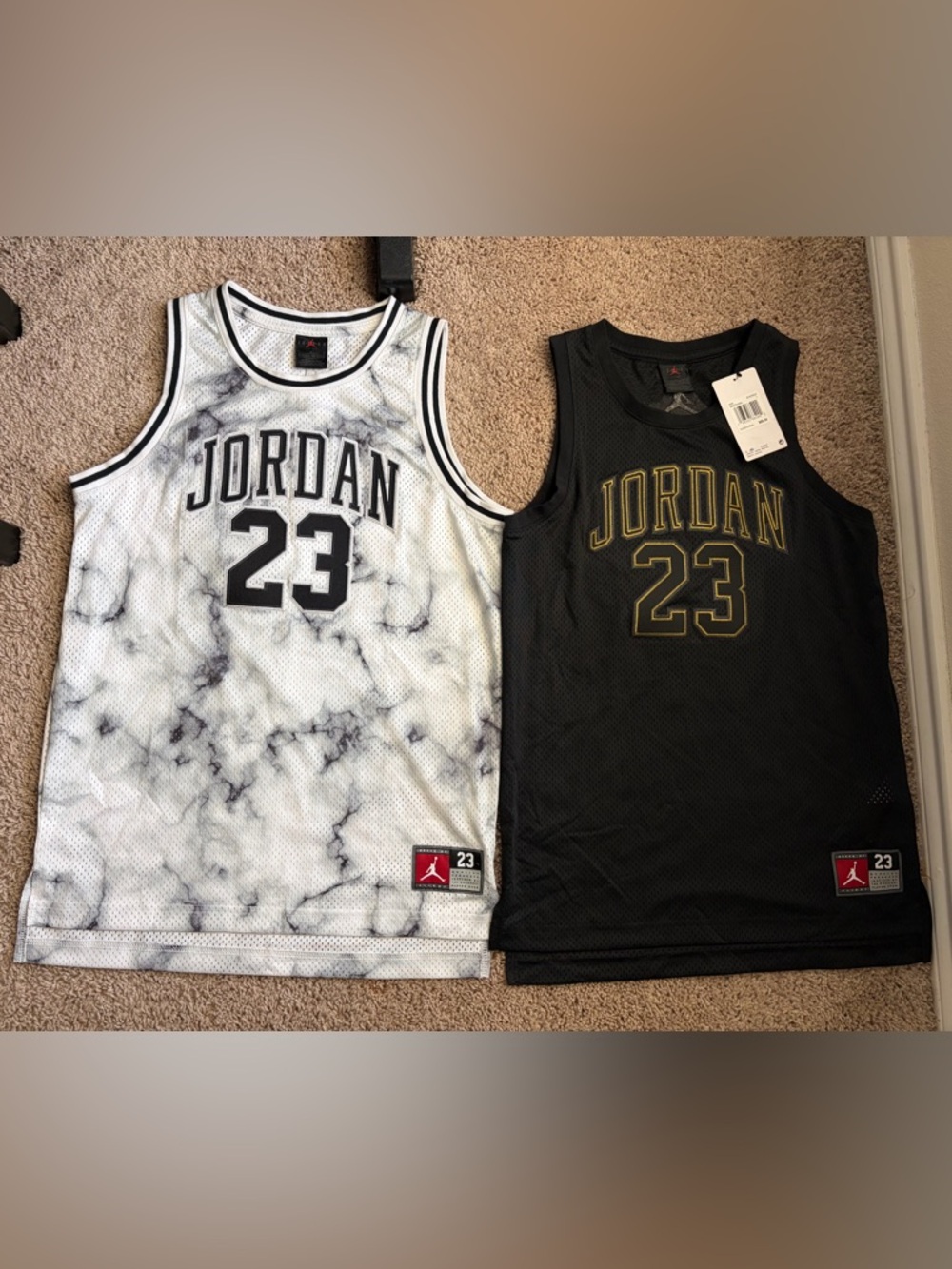2 boys large Jordan jerseys